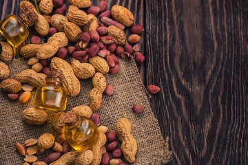 Image showing Natural peanut with oil in a glass