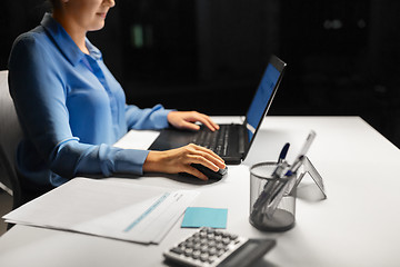 Image showing close up of businesswoman using computer mouse