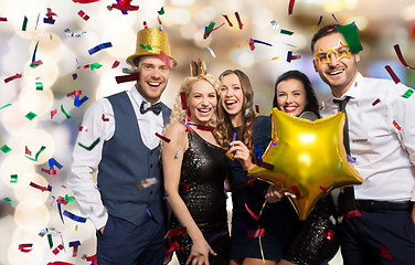 Image showing friends with party props and confetti laughing