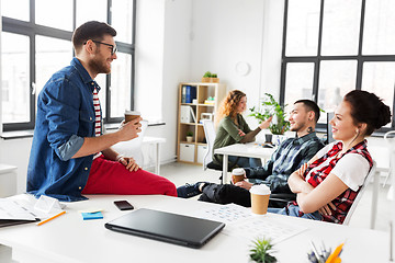 Image showing creative team drinking coffee at office