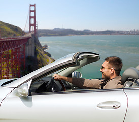 Image showing man driving car over golden gate bridge