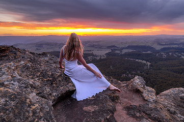 Image showing Girl in long white dress watching the sunset at Mt Blackheath