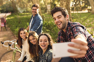 Image showing Friends in the park making a selfie