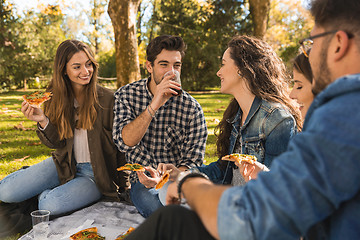 Image showing Friends eating pizza