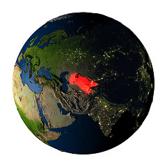 Image showing Uzbekistan in red on Earth isolated on white