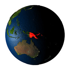 Image showing Papua New Guinea in red on Earth isolated on white