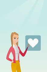 Image showing Young woman pressing heart shaped button.