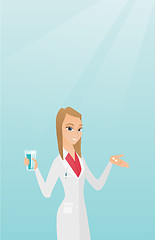 Image showing Pharmacist giving pills and a glass of water.