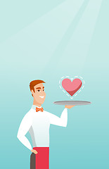 Image showing Waiter carrying a tray with a heart.