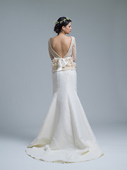 Image showing Rear view of a beautiful young woman in a wedding dress