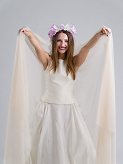 Image showing young bride in a wedding dress with a veil