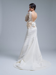 Image showing Rear view of a beautiful young woman in a wedding dress