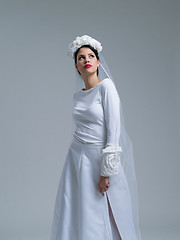 Image showing young bride in a wedding dress with a veil