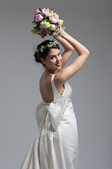 Image showing bride with a bouquet  isolated on white background