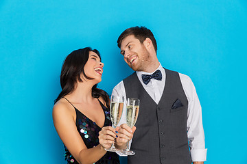 Image showing happy couple with champagne glasses at party