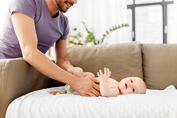 Image showing close up of father with little baby at home