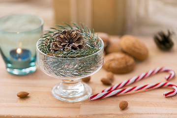 Image showing christmas fir decoration with cone in dessert bowl
