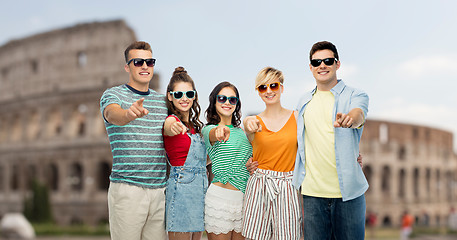 Image showing friends in shades pointing at you over coliseum