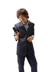 Image showing Asian business man and phone