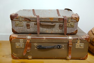 Image showing Vintage suitcases on the floor