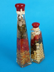 Image showing Vinegar Bottles on Blue