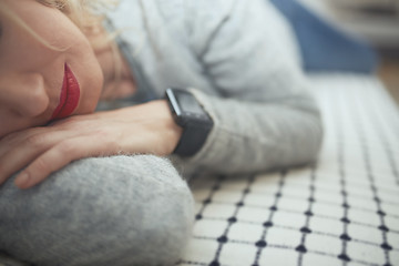 Image showing Woman sleeping with smart watch