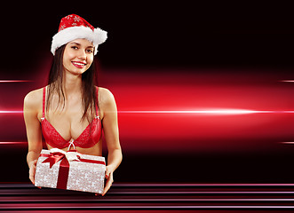 Image showing Santa girl delivering present