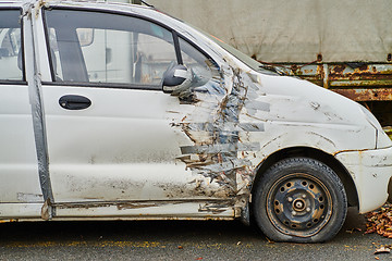 Image showing Car with duct tape repair