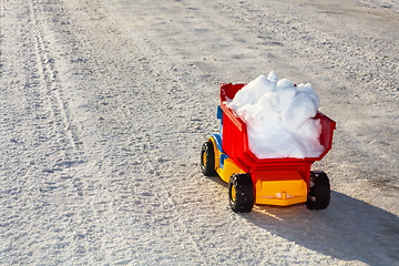 Image showing toy stuck removal snow from road