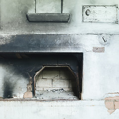 Image showing Part Of An Old Blackened Whitewashed Russian Oven