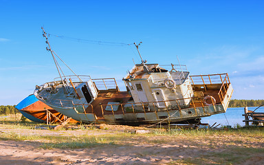 Image showing Old Abandoned Fishing Ships On The Riverbank