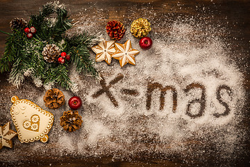 Image showing Christmas background with branch and gingerbread