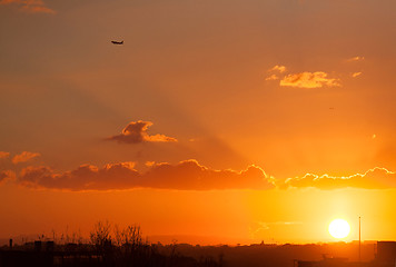 Image showing Sunset skies with sun rays