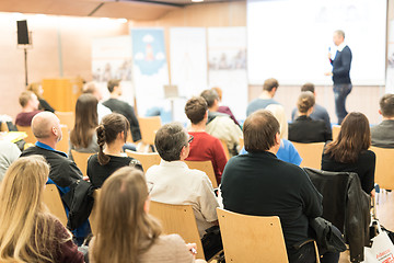 Image showing Business speaker giving a talk at business conference event.