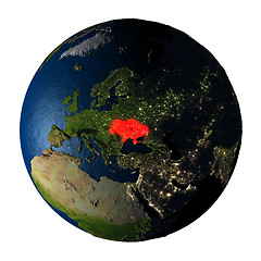 Image showing Ukraine in red on Earth isolated on white