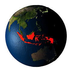 Image showing Indonesia in red on Earth isolated on white