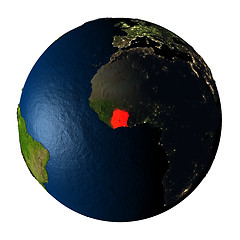 Image showing Ivory Coast in red on Earth isolated on white