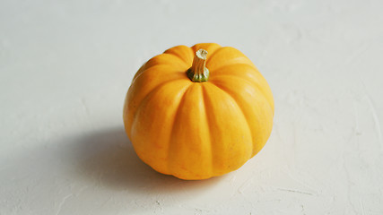 Image showing Yellow pumpkin laid in middle