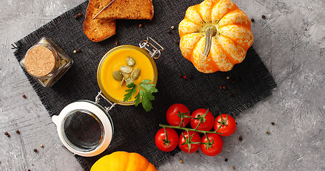 Image showing Pumpkin soup with vegetables on napkin