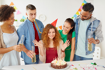 Image showing happy coworkers with cake at office birthday party