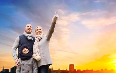 Image showing happy family over sunset in evening tallinn city