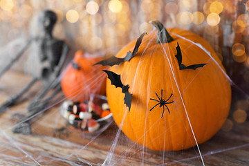 Image showing halloween pumpkins, skeleton and candies