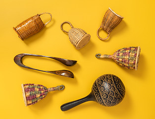 Image showing Wooden percussion instruments on yellow background