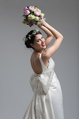 Image showing bride with a bouquet  isolated on white background