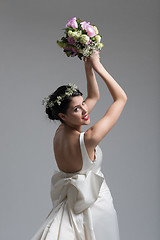 Image showing bride with a bouquet  isolated on white background