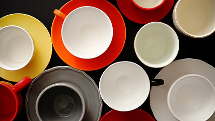 Image showing Empty colorful modern ceramic plates and cups collection