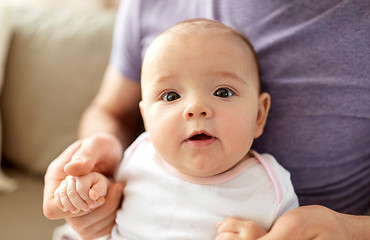 Image showing close up of father with little baby girl at home