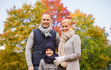 Image showing happy family over autumn park background