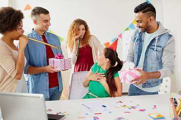 Image showing team greeting colleague at office birthday party