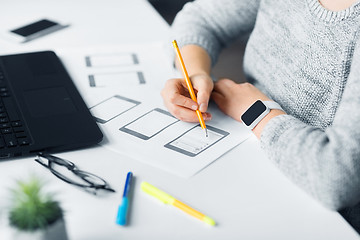 Image showing web designer working on user interface at office